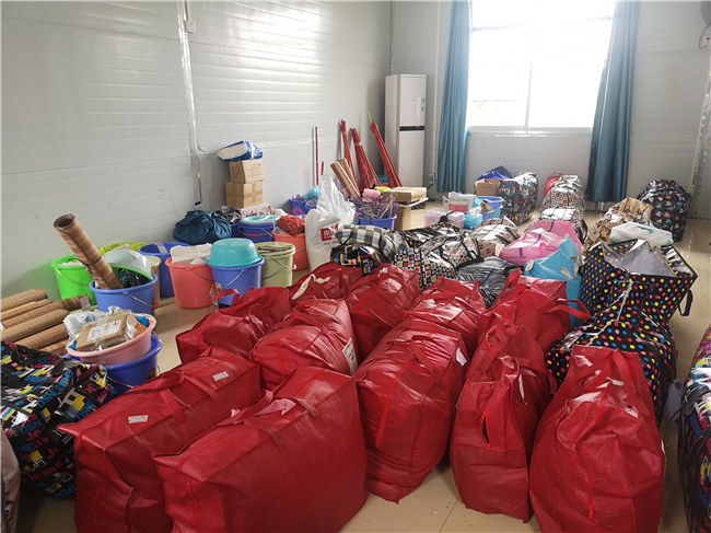 1615340800484464.jpg 4、行李到达坛洛校区,按班级存放,待同学们领取.jpg